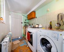 Кухня общего пользования во дворе в мини гостинице в Феодосии на улице 3-го Интернационала - фотография № 5